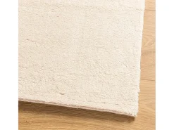 Alfombra HUARTE de pelo corto suave y lavable beige 100x200 cm