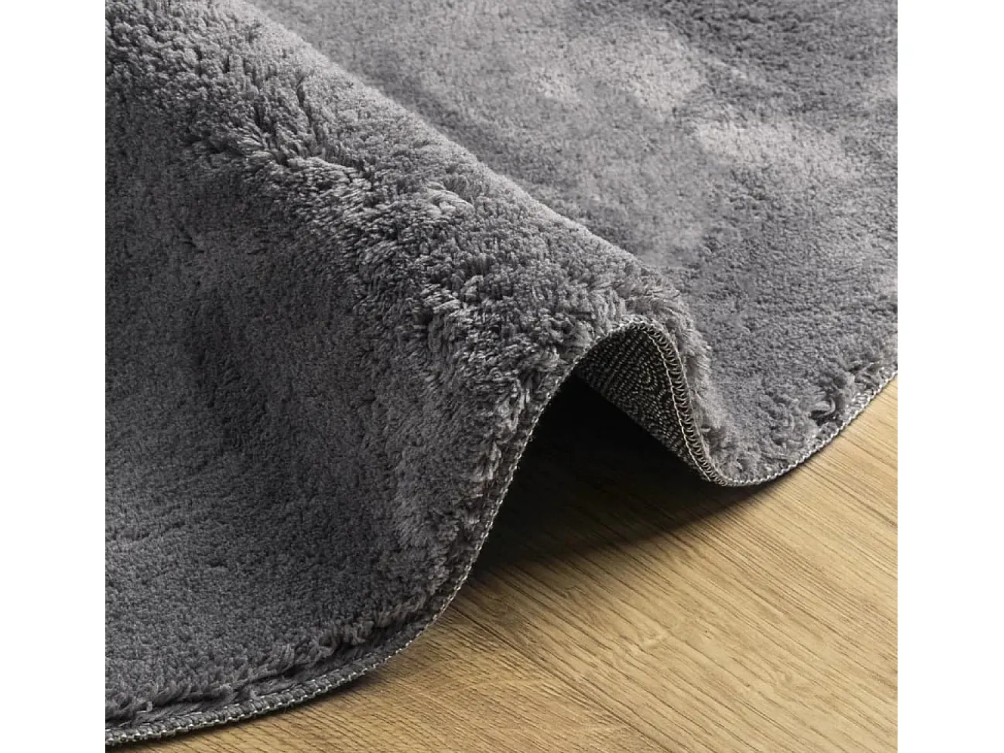 Alfombra HUARTE de pelo corto suave y lavable en color antracita Ø 200 cm
