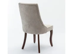 Conjunto de 2 sillas beige con patas de madera curvadas y respaldo alto.