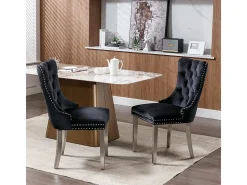 Conjunto de dos sillas de comedor de terciopelo, con patas de acero inoxidable cromado y tapizado con tachuelas, negro.