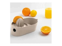 Exprimidor de cítricos gris Oblo Plus con filtro integrado y depósito - Colección CREATE