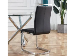 Juego de 4 sillas cantilever de PU negro con estructura de metal plateado
