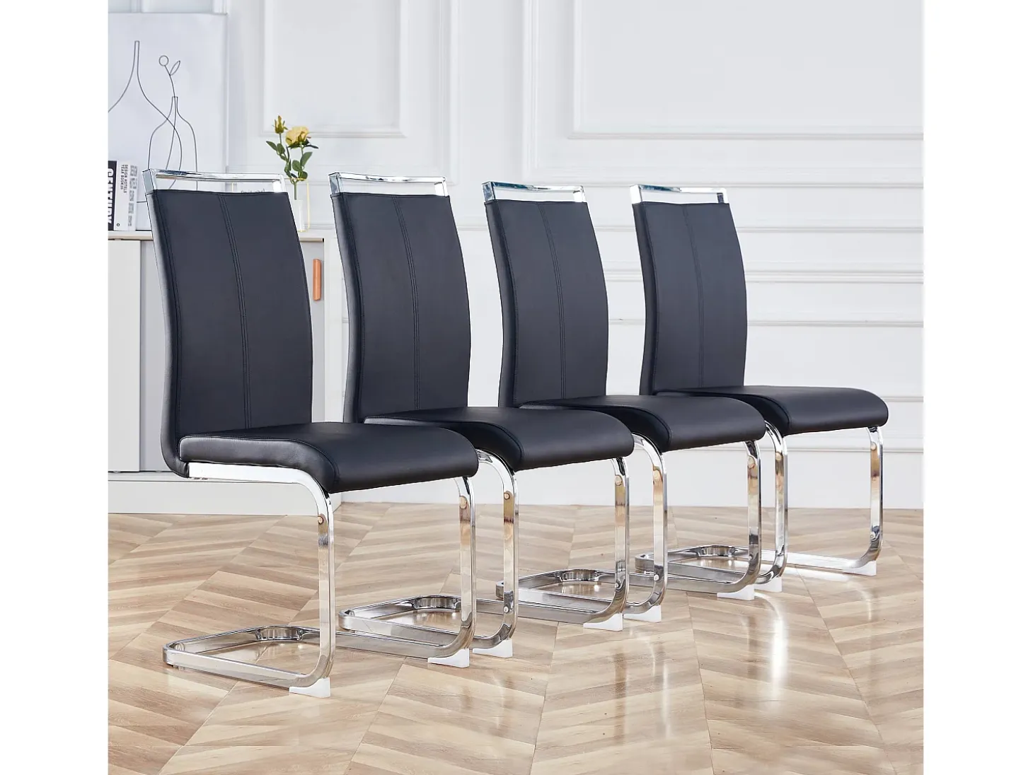 Juego de 4 sillas cantilever de PU negro con estructura de metal plateado