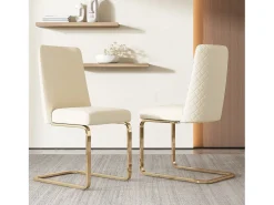 Juego de 2 sillas de comedor en terciopelo beige con respaldo tapizado y patas doradas.