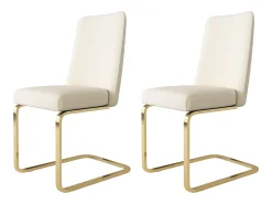 Juego de 2 sillas de comedor en terciopelo beige con respaldo tapizado y patas doradas.