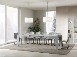 Mesa de comedor extensible de madera Naxo.-Color Gris cemento-Soporte 2 pies-5 alargaderas finas-Ancho extensible