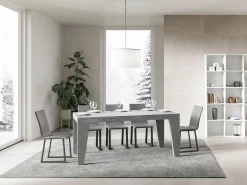 Mesa de comedor extensible de madera Naxo.-Color Gris cemento-Soporte 2 pies-5 alargaderas finas-Ancho extensible