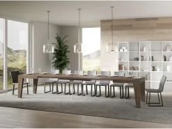 Mesa de comedor extensible de madera Naxo.-Color Marrón-Soporte 4 pies-5 alargaderas finas-Ancho extensible