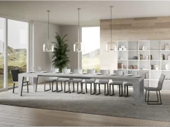 Mesa de comedor extensible de madera Naxo.-Color Gris cemento-Base y soporte con ruedas-5 alargaderas finas-Ancho extensible