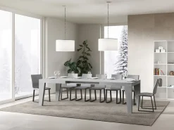Mesa de comedor extensible de madera Naxo.-Color Gris cemento-Soporte 2 pies-Alargaderas -Ancho extensible
