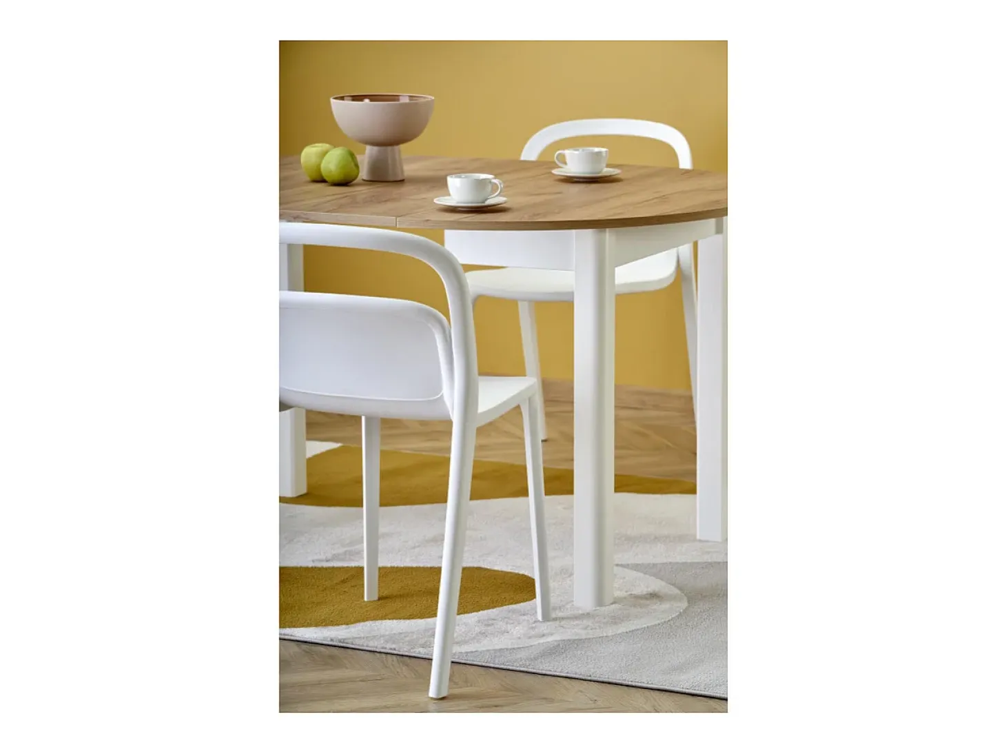 Mesa de comedor redonda extensible de 100 cm con tablero de aspecto roble y patas blancas CARENE