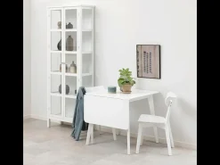 Mesa de comedor Roxby con 1 plato adicional color blanco.