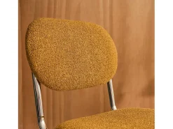 Silla cantilever redondeada de metal, borreguito texturizado y patas