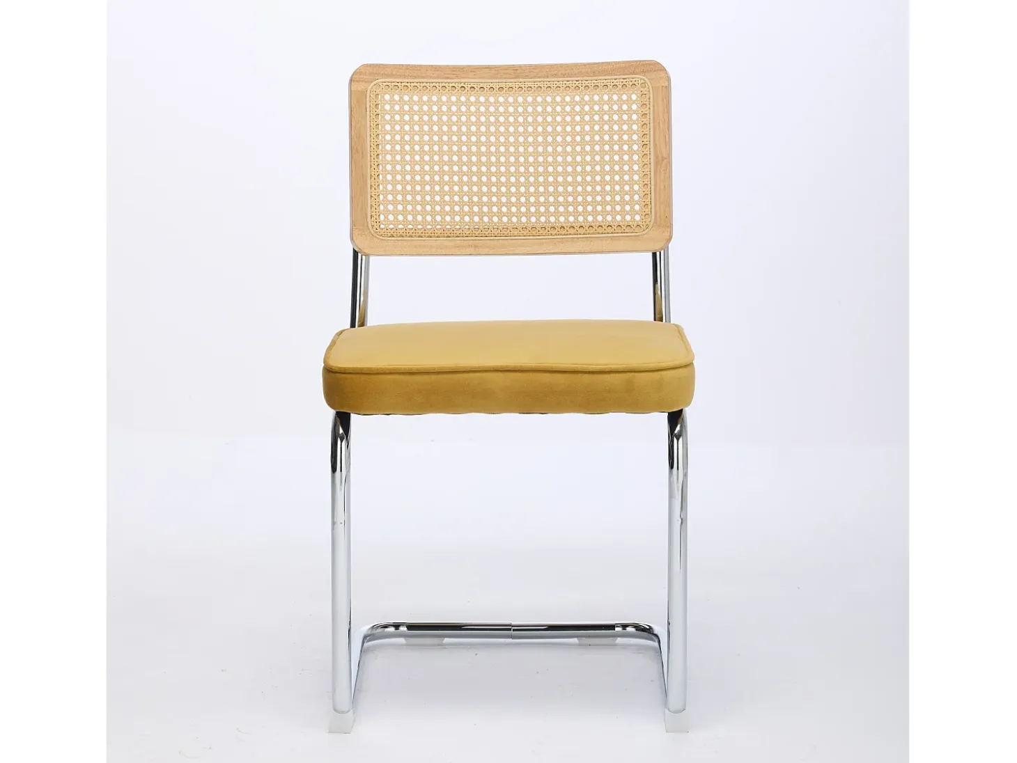 Silla de comedor - asiento voladizo de terciopelo con respaldo de ratán tejido dorado