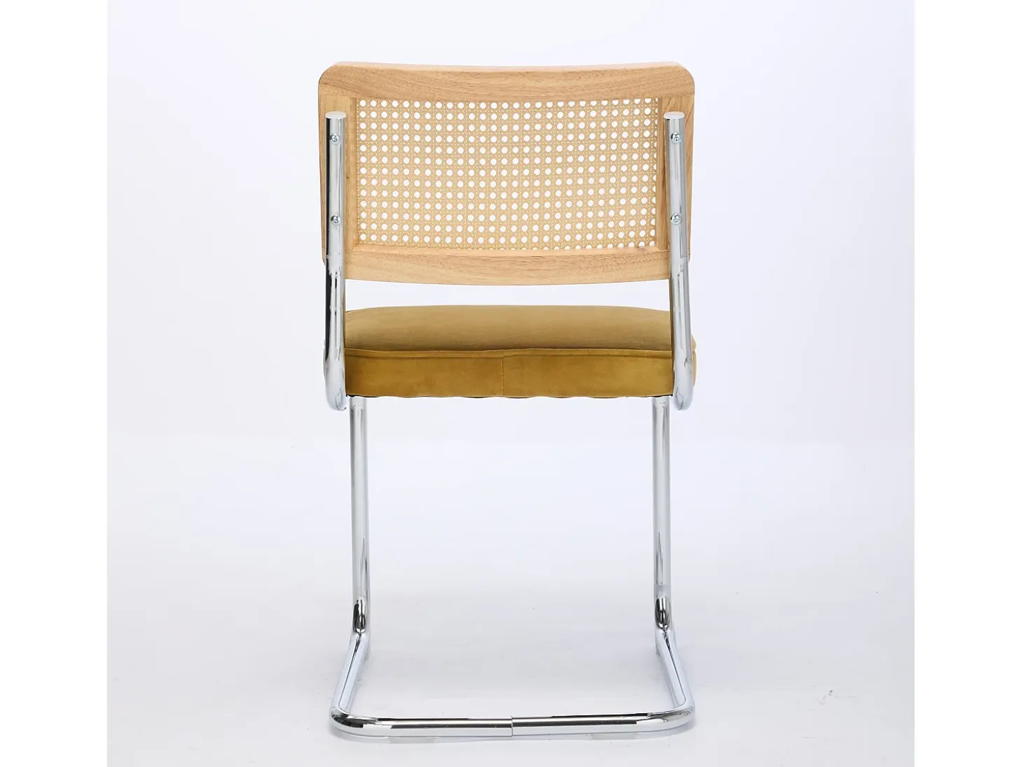 Silla de comedor - asiento voladizo de terciopelo con respaldo de ratán tejido dorado