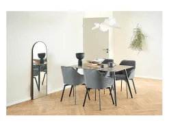 Silla de comedor Clara con reposabrazos tela gris.