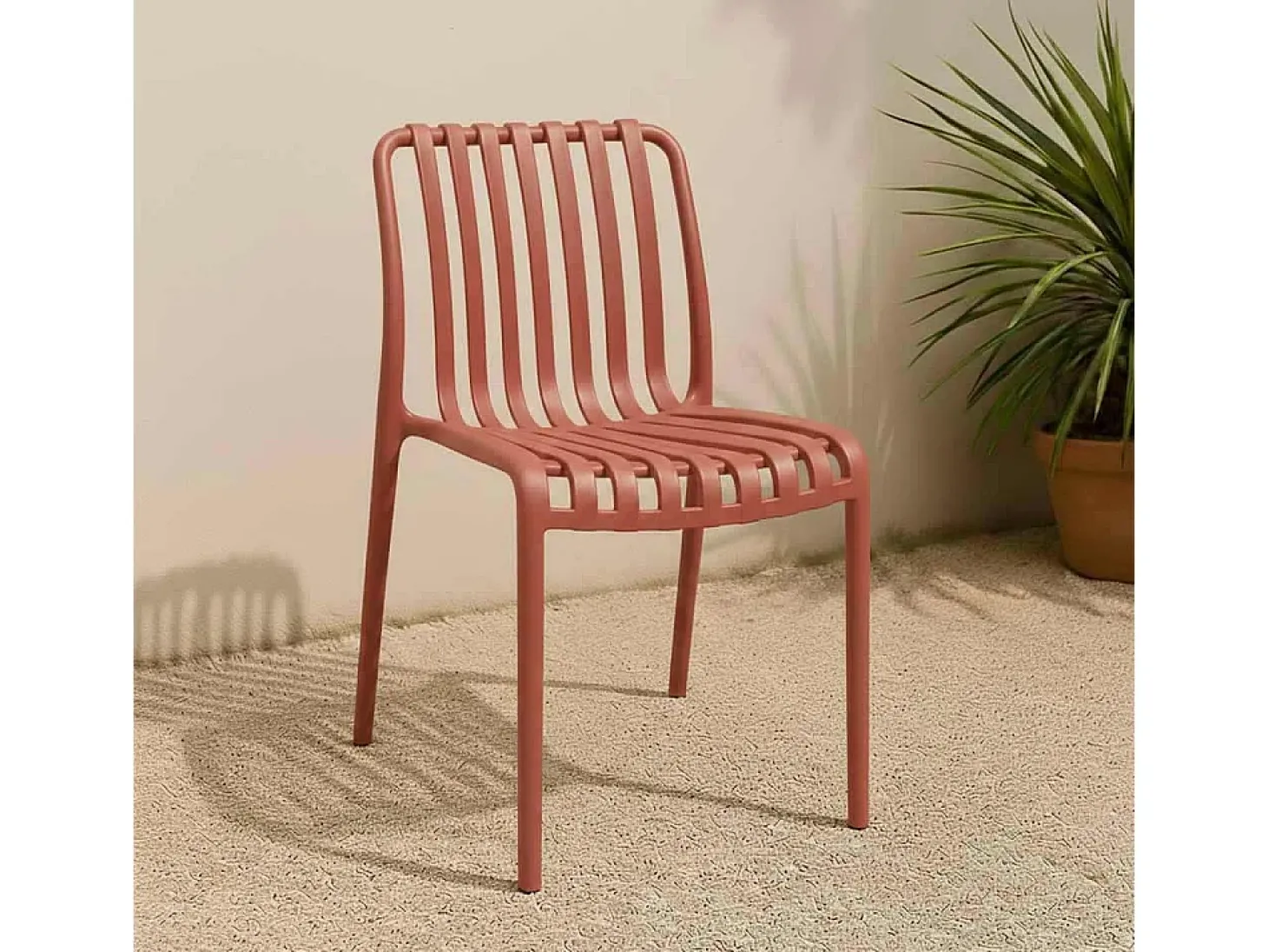 Silla de exterior Iside de plástico resistente, confort premium, color rojo ladrillo